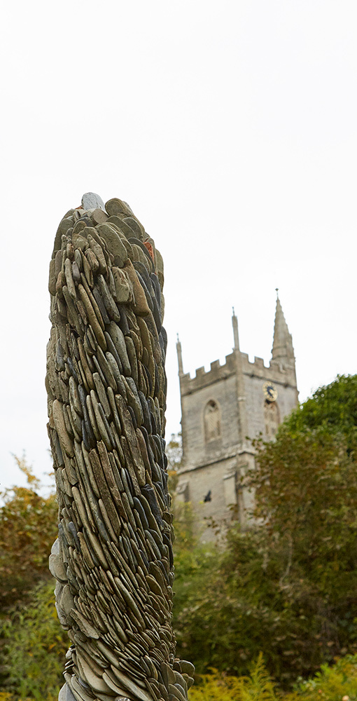detail of top of shale obelisk in garden