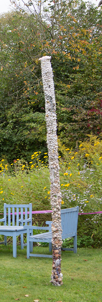 detail of top of shale obelisk in garden