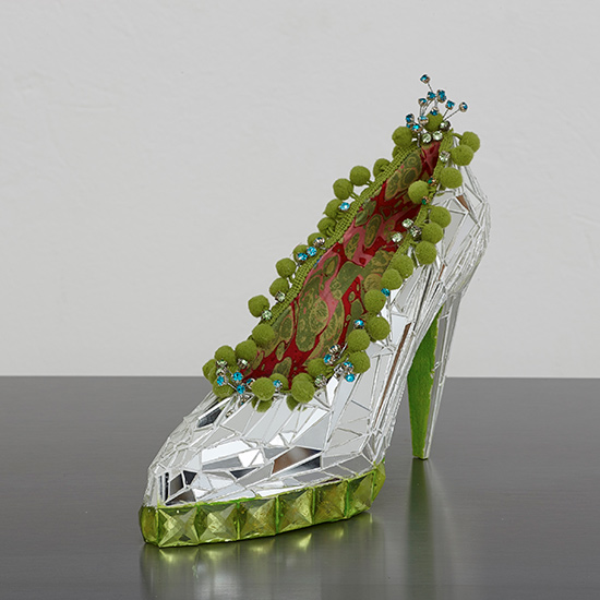 high heeled mirror mosaic shoe with green trim and heel